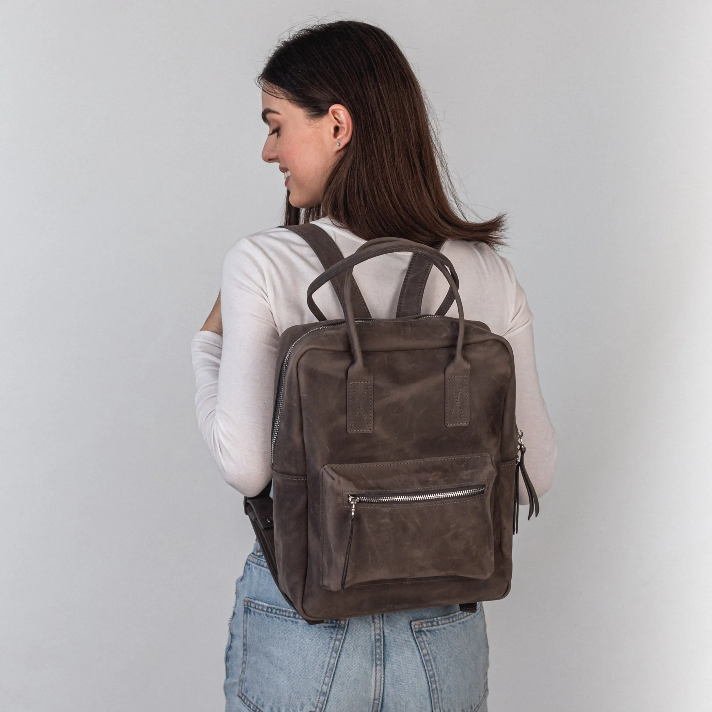 Gray leather city backpack